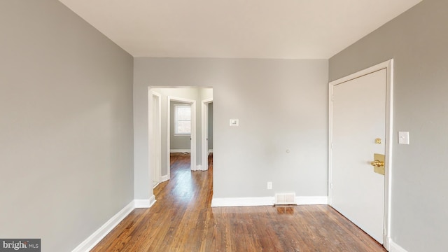 1126 Gleneagle Rd, Baltimore, MD 21239 - unfurnished room with wood finished floors and baseboards