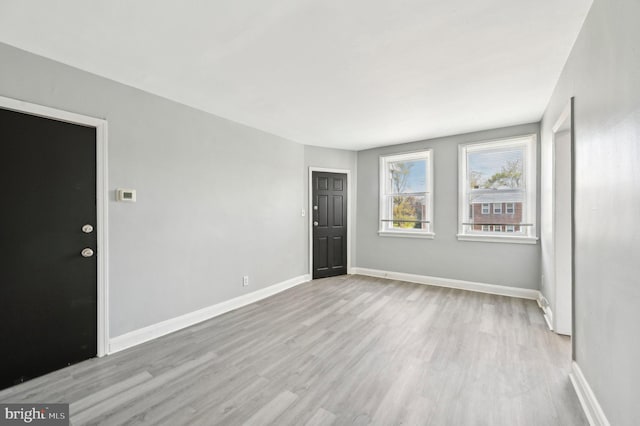 1126 Gleneagle Rd, Baltimore, MD 21239 - empty room featuring wood finished floors and baseboards