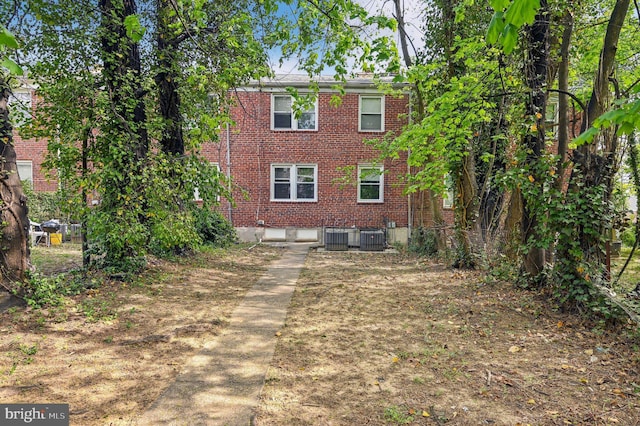 1126 Gleneagle Rd, Baltimore, MD 21239 - rear view of property featuring brick siding
