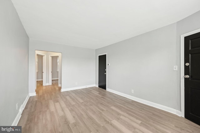 1126 Gleneagle Rd, Baltimore, MD 21239 - spare room with light wood-style flooring and baseboards