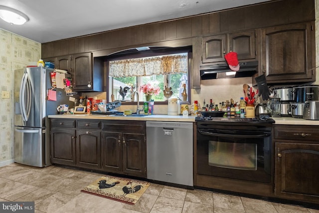 65 Silverspruce Rd, Levittown, PA 19056 - kitchen with stainless steel appliances, ventilation hood, light countertops, and dark brown cabinetry