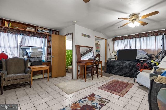 65 Silverspruce Rd, Levittown, PA 19056 - living area with a ceiling fan, lofted ceiling, plenty of natural light, and light tile patterned floors