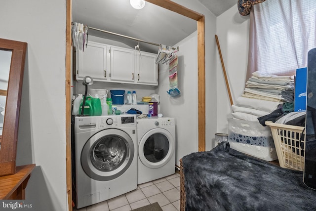 65 Silverspruce Rd, Levittown, PA 19056 - laundry room featuring washer and dryer, light tile patterned flooring, and cabinet space