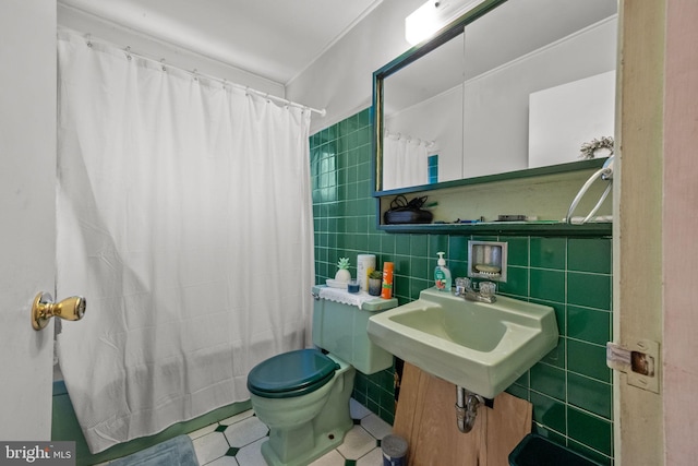65 Silverspruce Rd, Levittown, PA 19056 - full bathroom with tile walls and a shower with shower curtain
