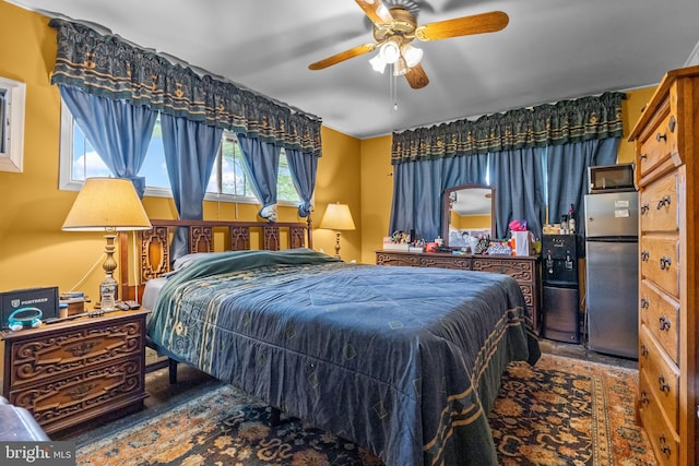 65 Silverspruce Rd, Levittown, PA 19056 - bedroom featuring freestanding refrigerator, ceiling fan, and wood finished floors