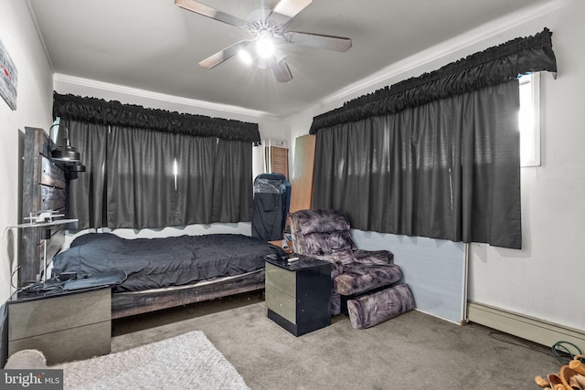 65 Silverspruce Rd, Levittown, PA 19056 - bedroom with carpet flooring, a baseboard heating unit, and a ceiling fan