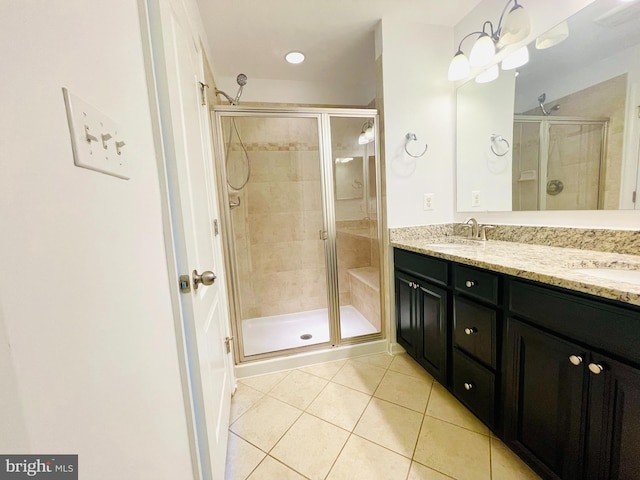 7120 Beaumont Pl, Hanover, MD 21076 - bathroom with tile patterned floors, double vanity, and a stall shower
