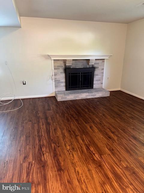 11876 Catoctin Dr, Woodbridge, VA 22192 - detailed view of a fireplace and wood finished floors