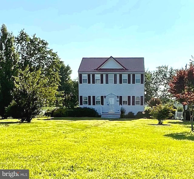 6535 Gravel Branch Rd, Hurlock, MD 21643 - colonial home featuring a front lawn