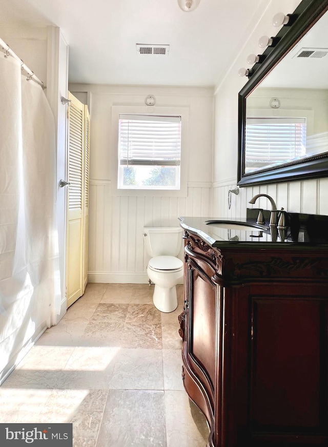 6535 Gravel Branch Rd, Hurlock, MD 21643 - bathroom with a wainscoted wall and vanity