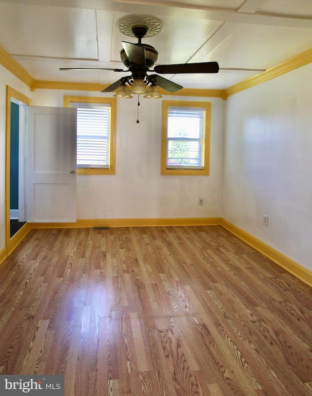 6535 Gravel Branch Rd, Hurlock, MD 21643 - unfurnished room with wood finished floors, ceiling fan, and ornamental molding