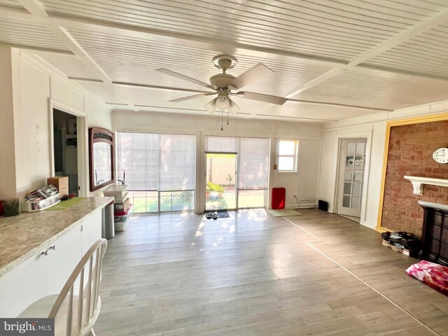 6535 Gravel Branch Rd, Hurlock, MD 21643 - unfurnished living room with a ceiling fan, wood finished floors, and beamed ceiling
