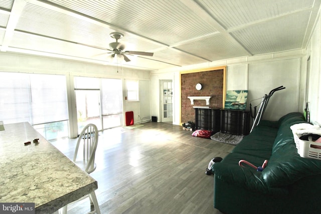 6535 Gravel Branch Rd, Hurlock, MD 21643 - living room with wood finished floors, ceiling fan, and a fireplace