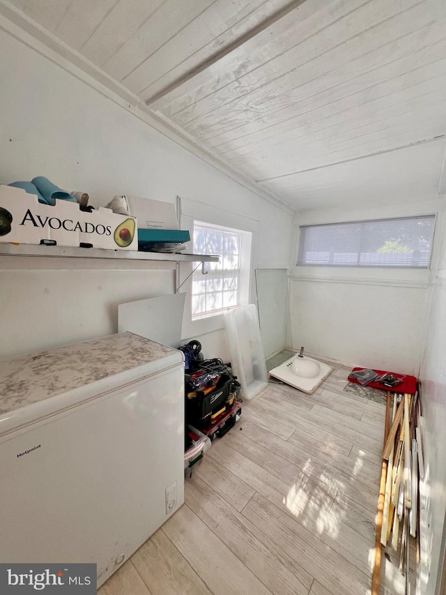 6535 Gravel Branch Rd, Hurlock, MD 21643 - bedroom with refrigerator, light wood-type flooring, and wood ceiling