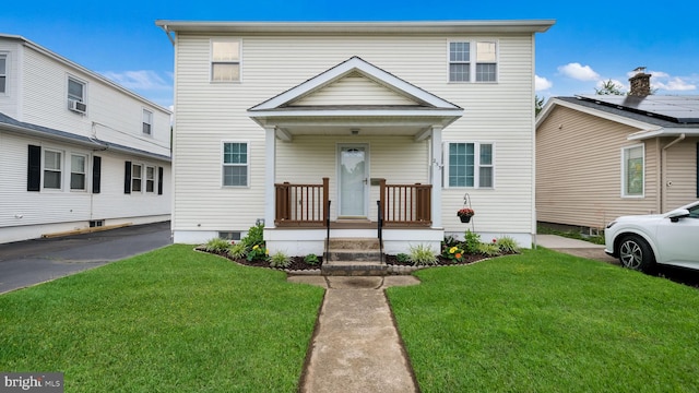 253 Roosevelt St, Bristol, PA 19007 - view of front facade with a front lawn