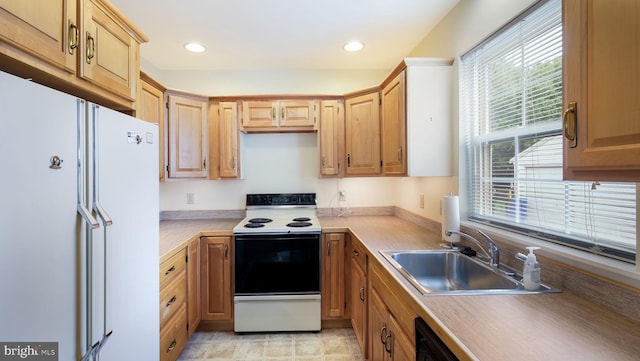 253 Roosevelt St, Bristol, PA 19007 - kitchen featuring white appliances, light countertops, and recessed lighting