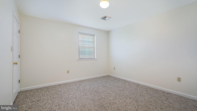 253 Roosevelt St, Bristol, PA 19007 - carpeted spare room with baseboards