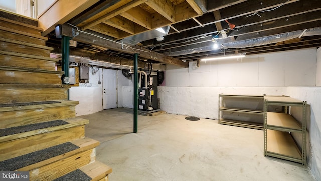 253 Roosevelt St, Bristol, PA 19007 - unfinished basement featuring heating unit, stairs, and electric panel