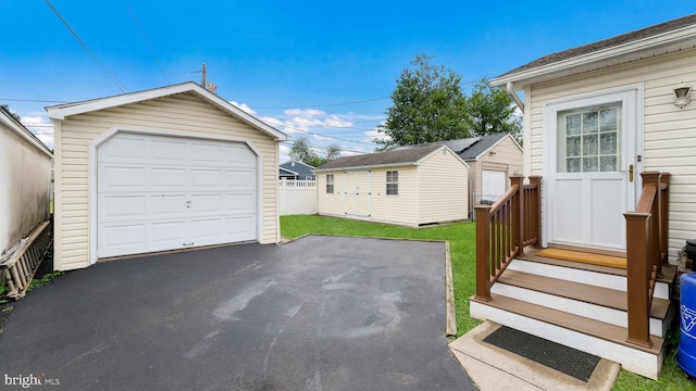 253 Roosevelt St, Bristol, PA 19007 - detached garage featuring asphalt driveway