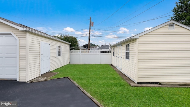 253 Roosevelt St, Bristol, PA 19007 - view of yard featuring an outdoor structure and a garage
