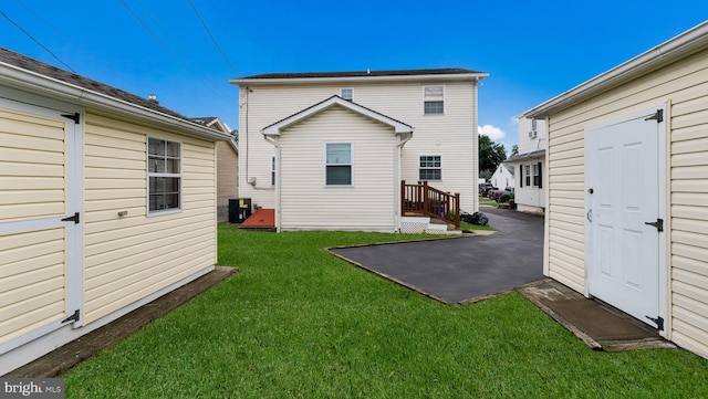 253 Roosevelt St, Bristol, PA 19007 - back of property featuring a patio and a yard