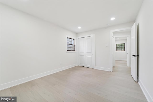 932 Cropwell Rd, Cherry Hill, NJ 08003 - unfurnished bedroom with light wood finished floors, recessed lighting, multiple windows, and a closet