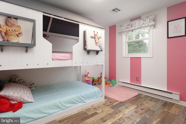 6 Shore Cir, Browns Mills, NJ 08015 - bedroom with baseboard heating and wood finished floors