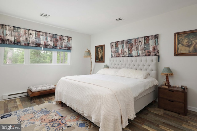 6 Shore Cir, Browns Mills, NJ 08015 - bedroom featuring a baseboard heating unit and wood finished floors