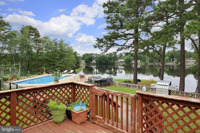 6 Shore Cir, Browns Mills, NJ 08015 - wooden deck featuring a grill, a water view, and a lawn