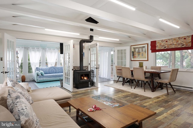 6 Shore Cir, Browns Mills, NJ 08015 - living area featuring wood finished floors, a wood stove, french doors, and beamed ceiling