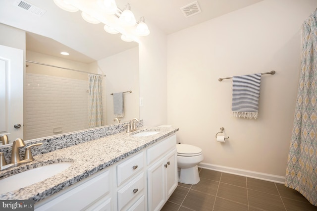 106 Pear Blossom Rd, Stafford, VA 22554 - bathroom with double vanity, curtained shower, and tile patterned floors