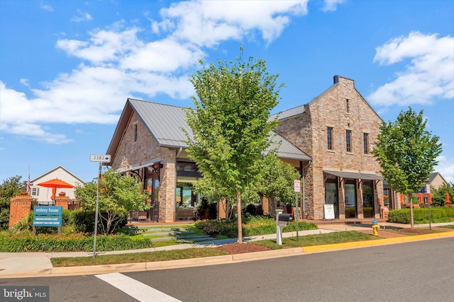 106 Pear Blossom Rd, Stafford, VA 22554 - view of front of home with a standing seam roof, stone siding, and a metal roof