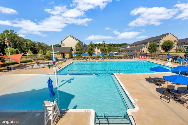 106 Pear Blossom Rd, Stafford, VA 22554 - community pool featuring a patio