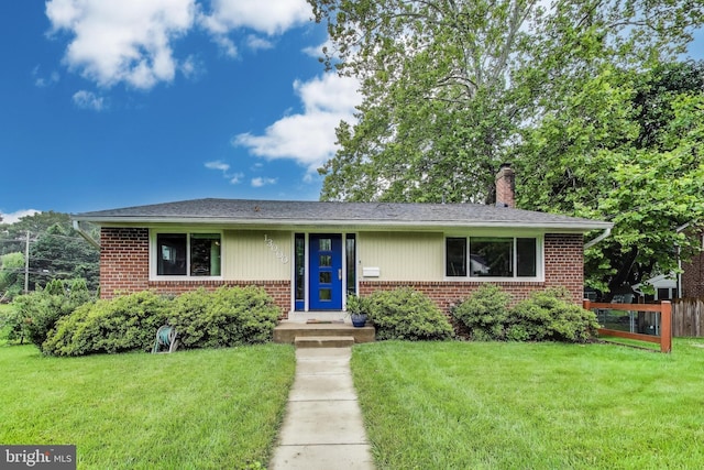 13000 Daley St, Silver Spring, MD 20906 - view of front facade featuring brick siding, a chimney, and a shingled roof