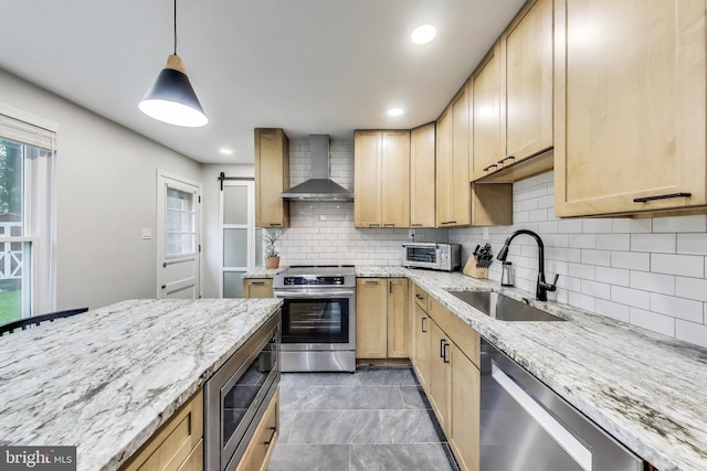 13000 Daley St, Silver Spring, MD 20906 - kitchen with wall chimney exhaust hood, appliances with stainless steel finishes, light brown cabinetry, decorative backsplash, and light stone counters