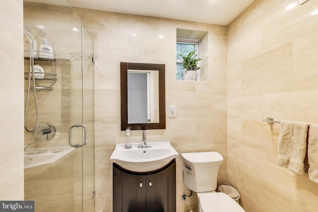 13000 Daley St, Silver Spring, MD 20906 - full bathroom featuring tile walls, vanity, and a shower stall
