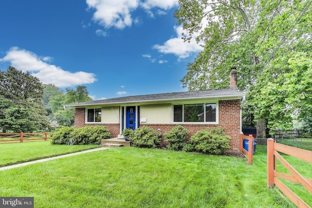 13000 Daley St, Silver Spring, MD 20906 - view of front facade featuring brick siding and a chimney