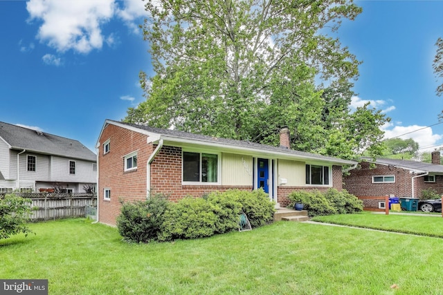 13000 Daley St, Silver Spring, MD 20906 - view of front of home featuring brick siding and a chimney