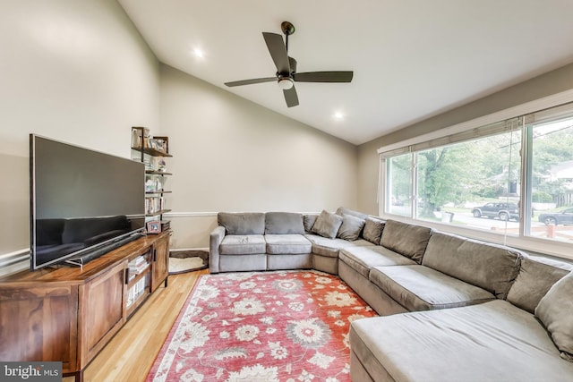 13000 Daley St, Silver Spring, MD 20906 - living room featuring lofted ceiling, light wood finished floors, and a ceiling fan