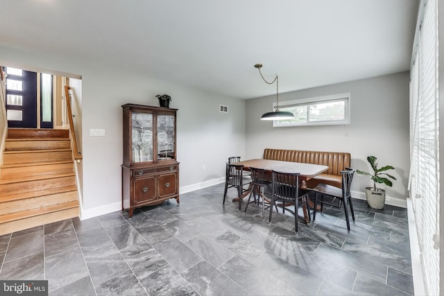 13000 Daley St, Silver Spring, MD 20906 - dining room featuring stairway and baseboards