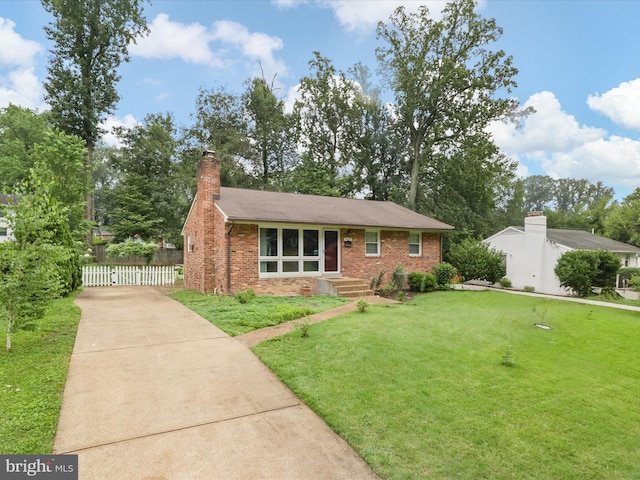 5415 Juliet St, Springfield, VA 22151 - view of front of property featuring brick siding, driveway, and a chimney