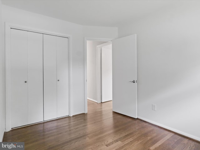 5415 Juliet St, Springfield, VA 22151 - unfurnished bedroom featuring wood finished floors and a closet