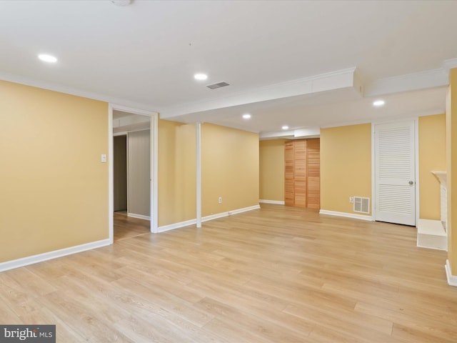 5415 Juliet St, Springfield, VA 22151 - finished basement featuring ornamental molding, recessed lighting, and light wood-type flooring