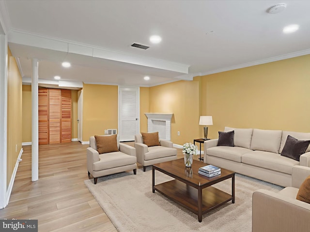 5415 Juliet St, Springfield, VA 22151 - living room with crown molding, light wood-style floors, and recessed lighting