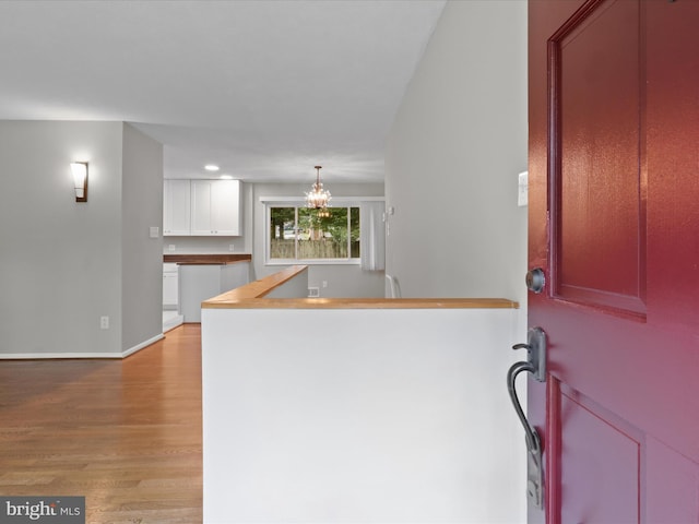 5415 Juliet St, Springfield, VA 22151 - foyer entrance with light wood-style flooring, a chandelier, and recessed lighting
