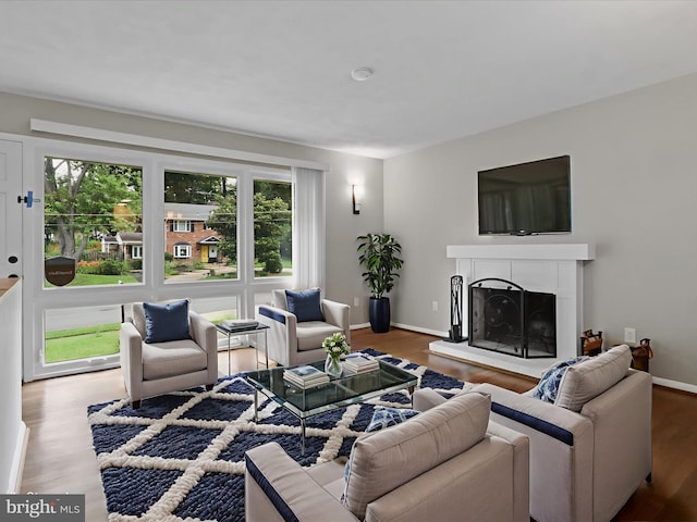 5415 Juliet St, Springfield, VA 22151 - living room with a fireplace with raised hearth and wood finished floors