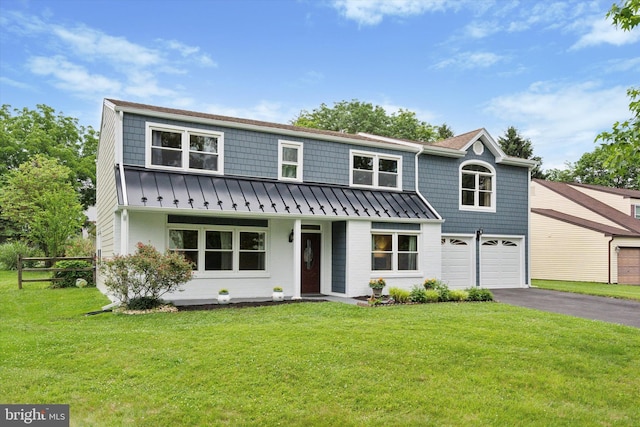 4133 Dana Ln, Lafayette Hill, PA 19444 - view of front of property with a standing seam roof, asphalt driveway, a garage, a porch, and a metal roof