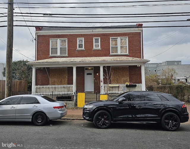 1941 16th St SE, Washington, DC 20020 - view of front facade with brick siding and covered porch