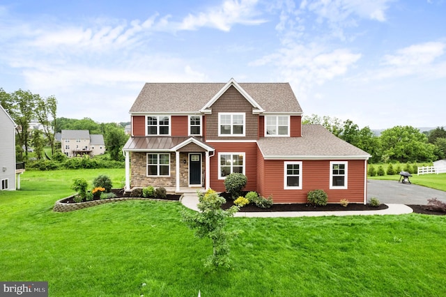 7 Compton Way, Barto, PA 19504 - view of front of home with stone siding, a front yard, roof with shingles, and a porch