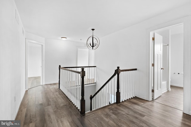 7 Compton Way, Barto, PA 19504 - hallway featuring an upstairs landing, wood finished floors, and a chandelier